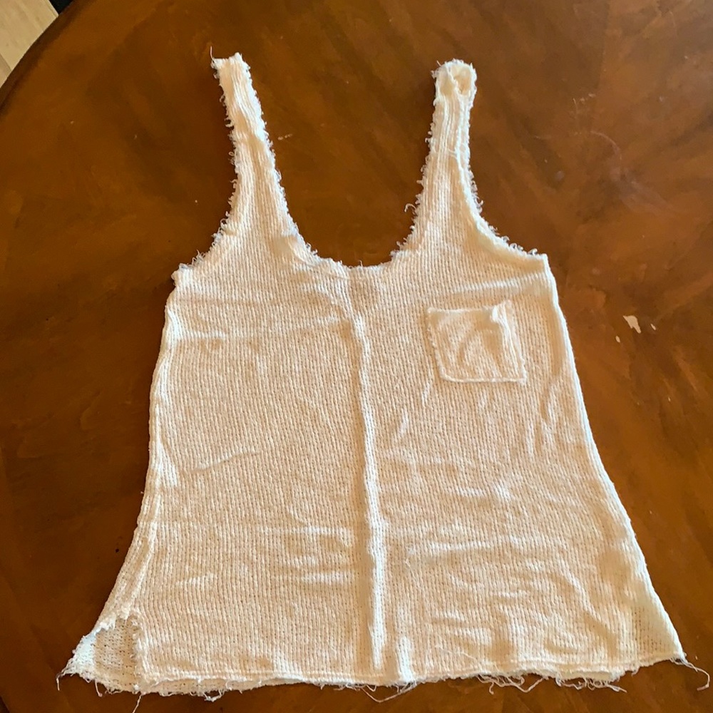 Tank top- cream color; XSmall; frayed look to it. Fits loose.